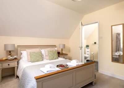 Upper Wing is a large, luxury and dog-friendly holiday apartment with a tennis court on a private estate near the North Norfolk coast | Gresham Hall Estate